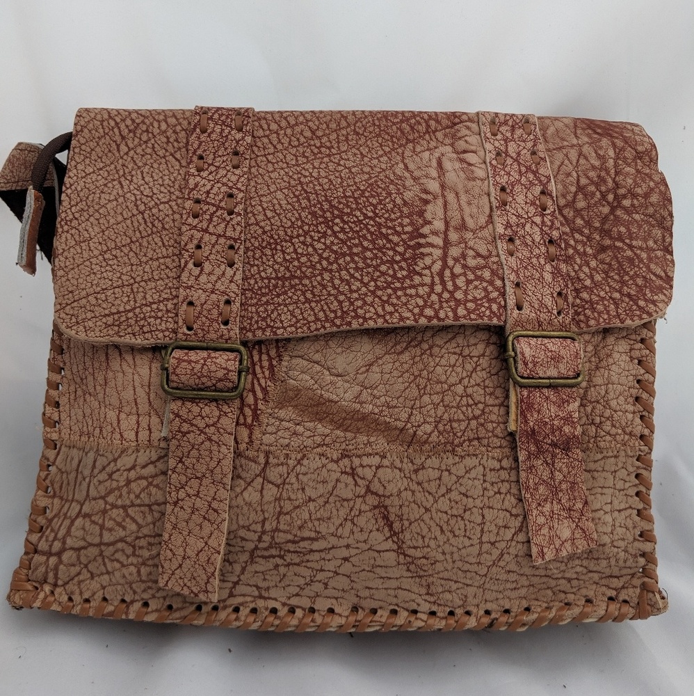 Raw leather messenger bag